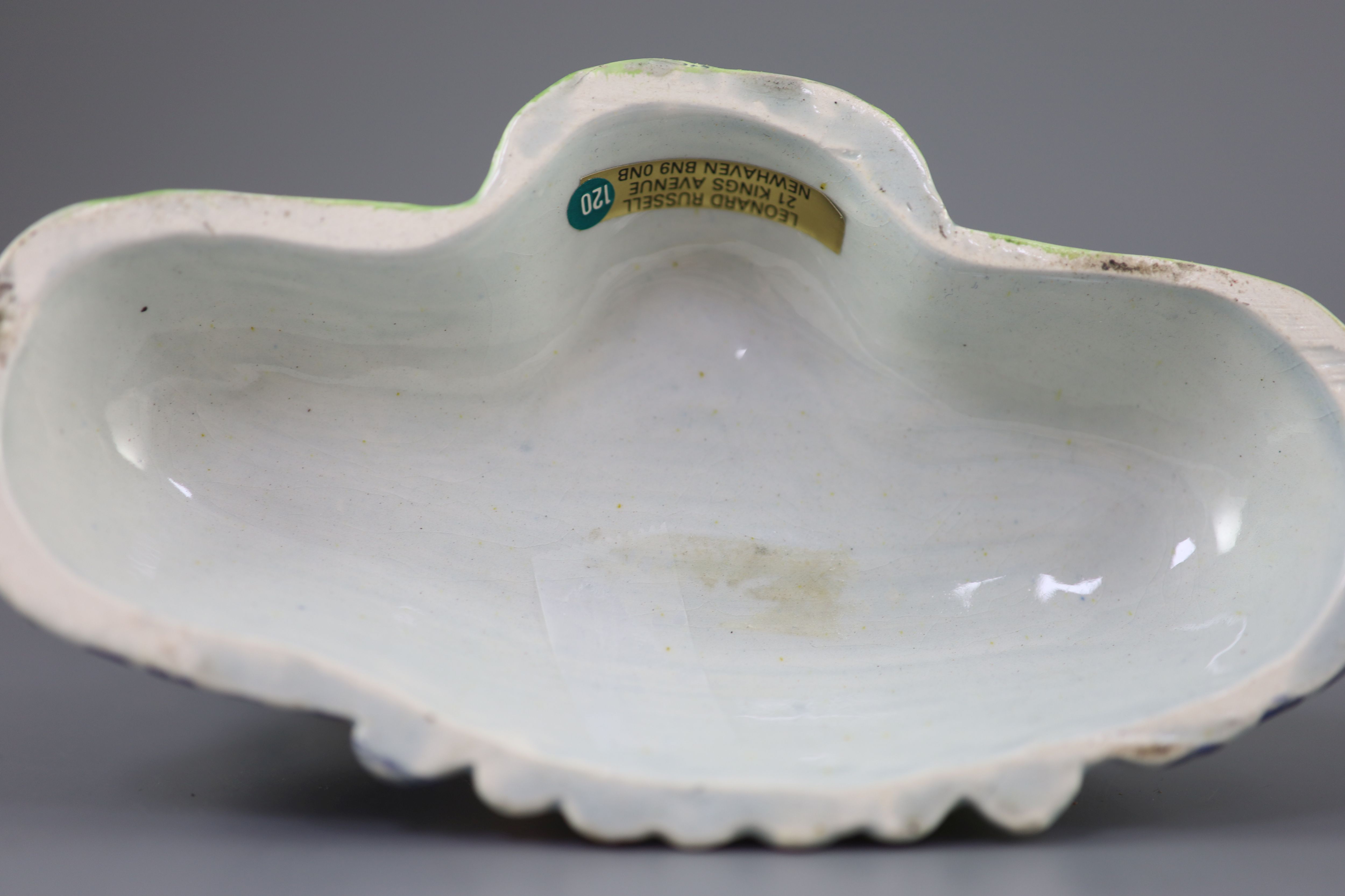 A Staffordshire pearlware group Tithe pig, c.1820-30, 20cm high